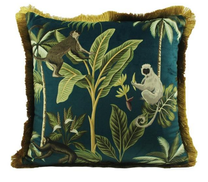 Tropical velvet cushion with monkeys.