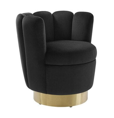 Black lounge chair with golden foot.